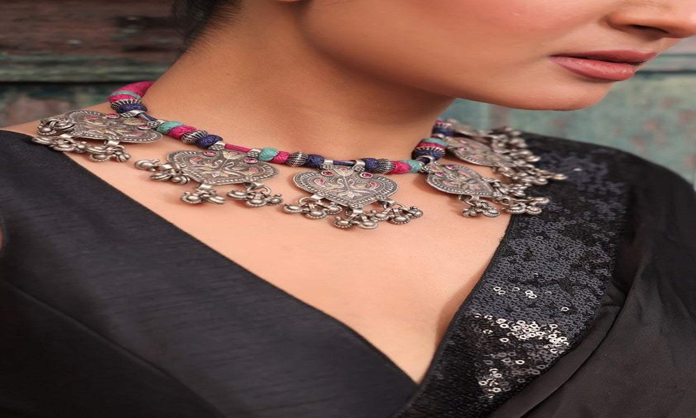 Graceful Style with Silver Haram Jewelry and Patan Patola Elegance